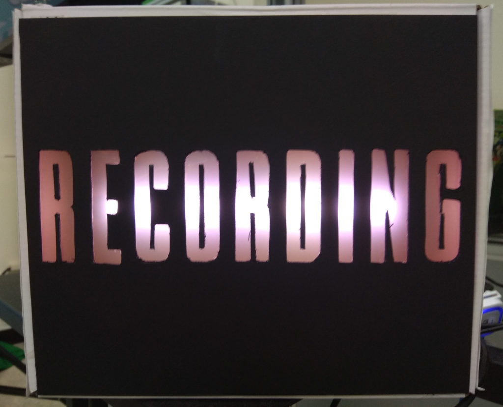 A lighted recording sign